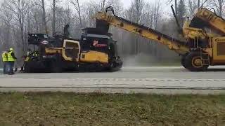 Filling Hopper On the Fly Integral dx Spray Paver [upl. by Aicram]