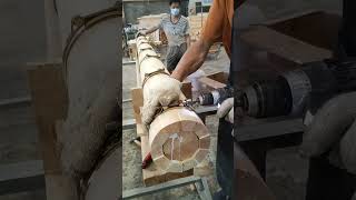 The process of strengthening the outer layer of wood load bearing columns [upl. by Ellinej]