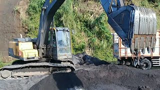 excavator working loading sand into truck bed  sand mining [upl. by Woodsum]