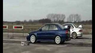 Mitsubishi Evolution VI 6 vs Subaru Impreza 14 mile race [upl. by Christmas]