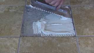 LATICRETE Pro Tips How to Remove and Replace a Chipped or Broken Tile [upl. by Ellevel]