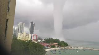 Huge Waterspout Makes Landfall at Malaysian Seaside Resort [upl. by Ahsinnek187]