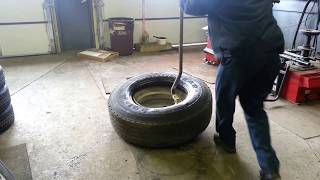 Dismounting a 31580R225 fire truck rear tire [upl. by Neale624]