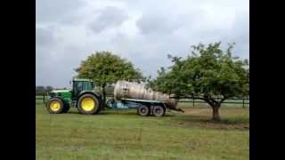 Rozlewanie gnojowicy Spreading slurry with JD 6930 Premium [upl. by Bocoj]