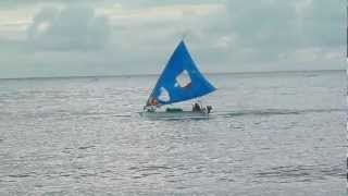 Junkung Bali fishing boat landing after an early morning fishing trip in a Jukung on the Amed Coast [upl. by Eymaj]