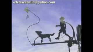 Veleta kinetic sculpture of Child dog and kite [upl. by Llednyl307]