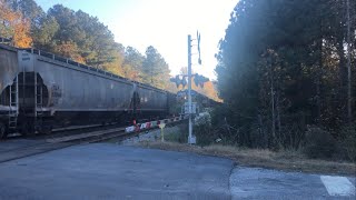 CSX 3150 meets CSX 872 as it passes by him and CSX 1850 on 112223 [upl. by Atinuj]