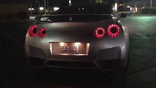 Nissan GTR R35 Flame thrower exhaust crazy Flames pop bangs cobb accessport [upl. by Ahseekan]