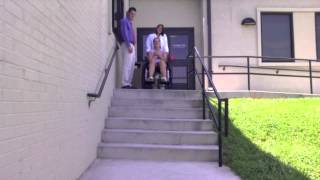 Descending steps with a wheelchair with assistance [upl. by Sucramej]