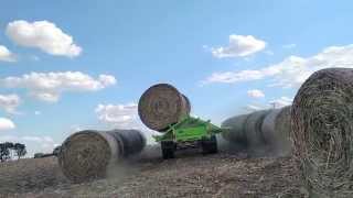 Pyramid Bale Trailer Unloading 17 Bales 08 19 2015 [upl. by Yereffej]