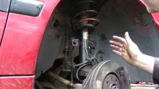 Peugeot Suspension strut removal and top mount bearing replacement [upl. by Aikemit]